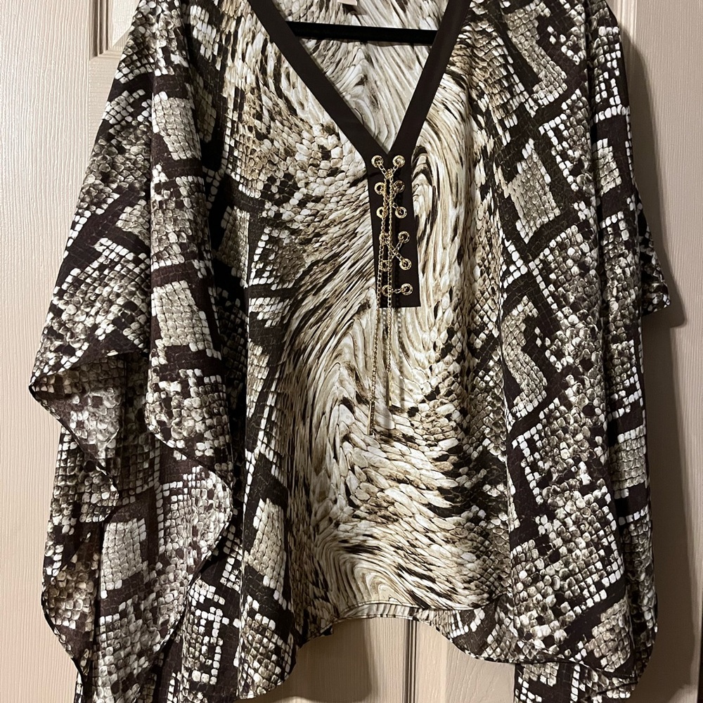 Michael Kors cape top in like new condition. Wore one time.